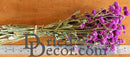 Bulk dried globe amaranth bunches with vibrant purple flowers and natural stems.