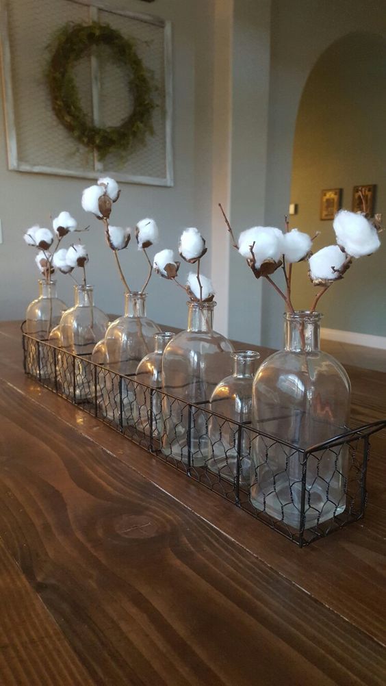 Cotton stalks and cotton balls are a unique option to style your place.