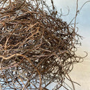 Bundle of dried natural curly Angel Vine branches in bulk, perfect for decorative accents.