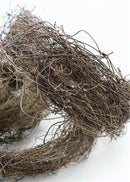 A bundle of natural angel vine with a curly and textured appearance.
