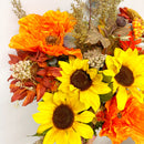 Vibrant dried sunflowers and poppies bouquet with natural autumn foliage, perfect for bulk wholesale arrangements.