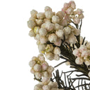 Bulk dried natural rice flower bundles in soft white and pale pink shades.