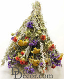 A bundle of dried yellow flowers with hints of other colors, arranged together.