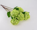 A artificial hydrangea spray with multiple stems and green flowers, arranged against a white background.