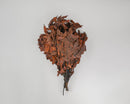 Bulk bundle of dried natural chocolate brown oak leaves with stems, wholesale 25-pound case.