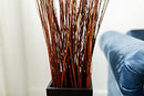 Bundle of dried natural Asian willow branches, 4-5 feet tall, displayed in a black vase, wholesale bulk quantity.