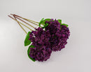 A synthetic hydrangea spray with 12 stems, featuring eggplant purple flowers and green leaves, against a white background.