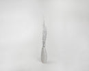 White glittered dried birch branches in a tall vase emphasizing natural bulk wholesale decor.