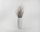 Bundle of natural light brown dried huckleberry branches in a white vase, wholesale bulk set.