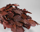 Bulk dried preserved lemon leaves in a deep burgundy shade with natural texture.