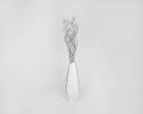 Silver dried curly Ting Ting branches arranged in a tall white textured vase, natural wholesale bulk decor.