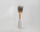 Dried natural wheat bundle with black-tipped stalks in tall white ceramic vase, wholesale bulk decor.