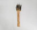 Bundle of dried natural wheat stacks in bulk, long stems with dark wheat heads, wholesale size.