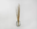 Dried natural straight Ting Ting branches with gold glitter in a clear glass vase, bulk wholesale decor.
