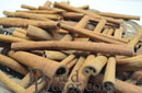 Bulk natural dried cinnamon sticks in varying lengths, ideal for wholesale dried floral supplies.