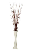 Bundle of 4-5' tall dried natural Asian willow branches in bulk, brown stems in white vase.