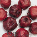Bulk dried natural pomegranate seeds in deep red, perfect for wholesale and bulk use.